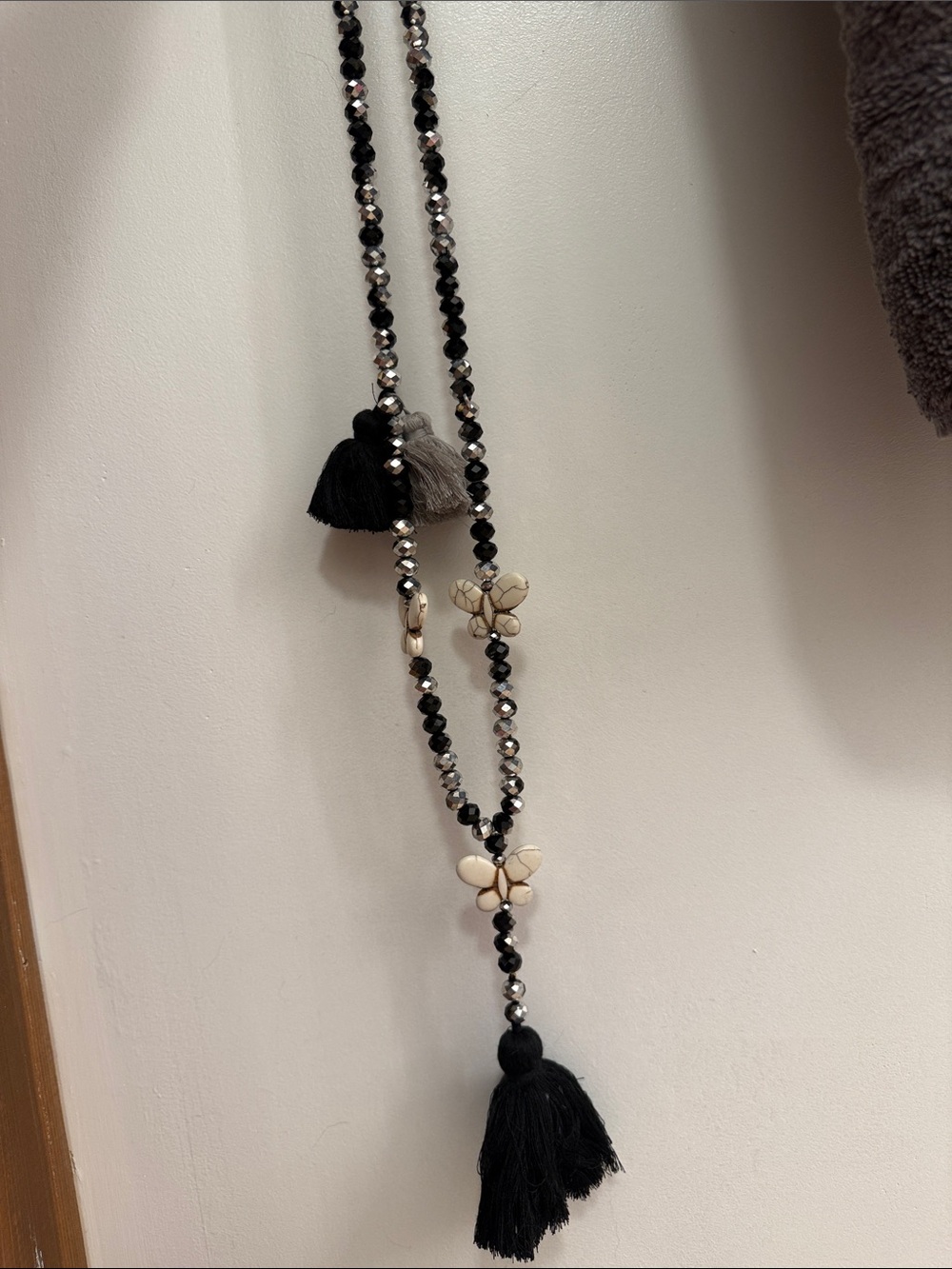 Black Beaded Tassel Necklace with Ivory Butterfly Accents